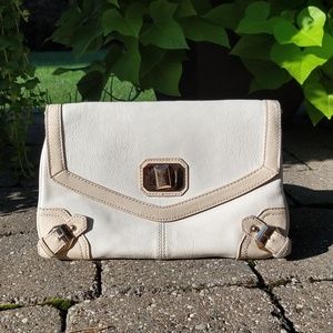 Tan and white clutch